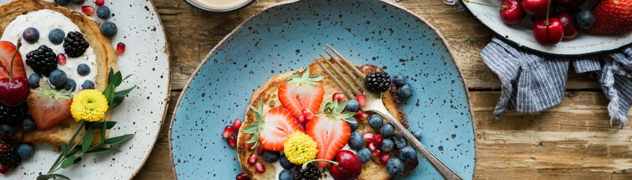 French Toast with Seasonal Berries on a Table